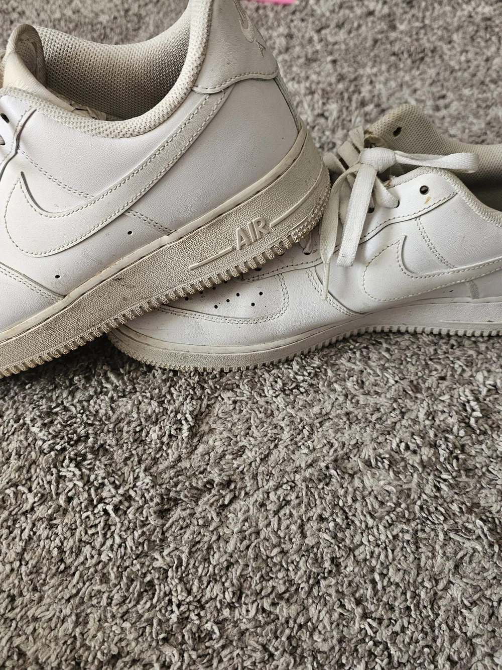 Nike White Low-Top Sneakers with Subtle Black Swoosh